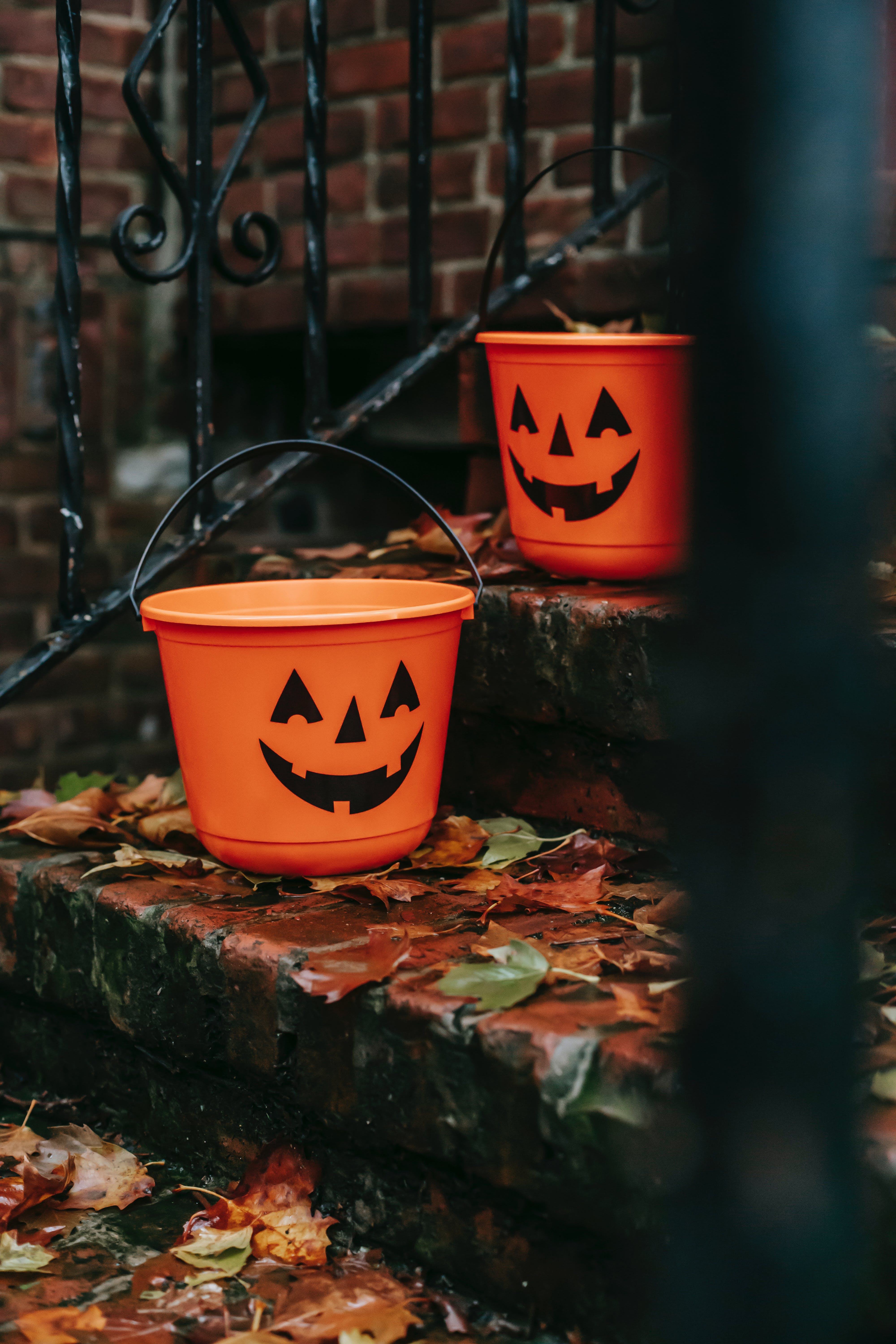 Photo by Charles Parker: https://www.pexels.com/photo/orange-buckets-with-halloween-symbols-outside-house-5859553/ Home Decoration GPT 